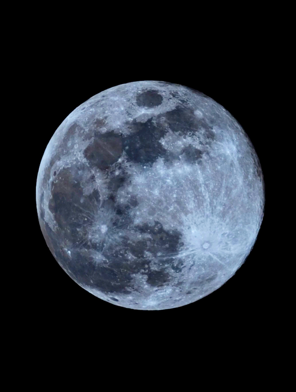 Close-up of the moon's cratered surface